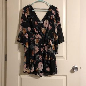Bailey Blue black floral romper with sheer sleeves